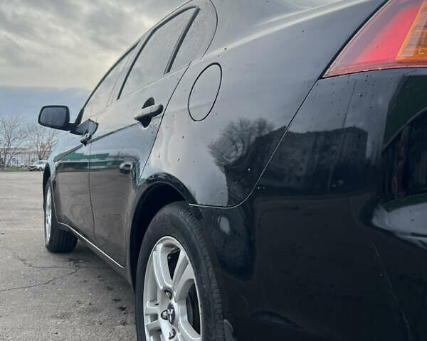 Чорний Міцубісі Lancer, об'ємом двигуна 1.5 л та пробігом 209 тис. км за 5500 $, фото 13 на Automoto.ua