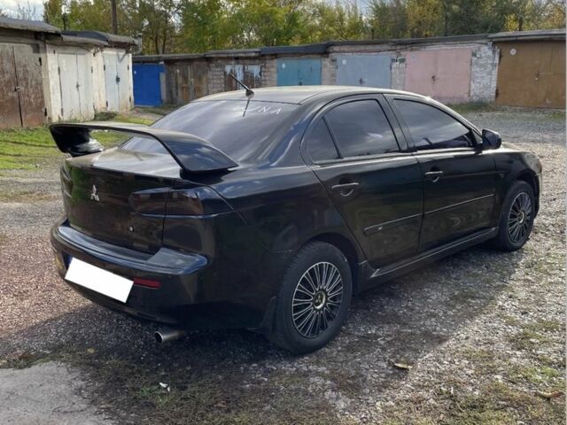 Мицубиси Лансер 2007 в Кривом Роге на Automoto.ua Черный Мицубиси Лансер, объемом двигателя 1.5 л и пробегом 150 тыс. км за 6500 $, фото 3 на Automoto.ua