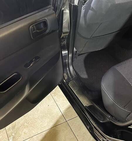 Черный Мицубиси Лансер, объемом двигателя 1.6 л и пробегом 249 тыс. км за 5000 $, фото 17 на Automoto.ua