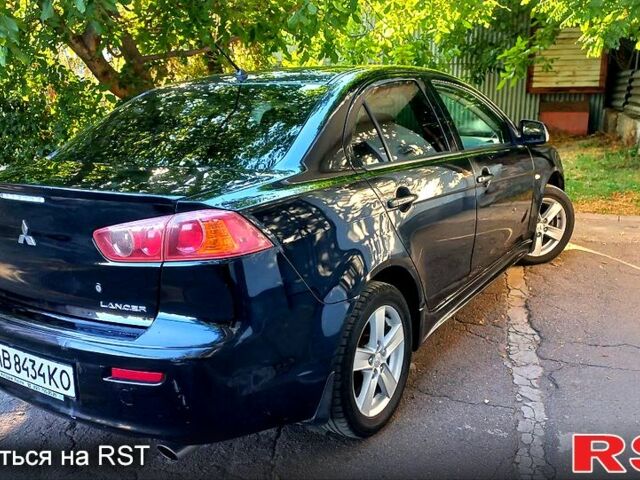 Черный Мицубиси Лансер, объемом двигателя 2 л и пробегом 290 тыс. км за 5800 $, фото 1 на Automoto.ua