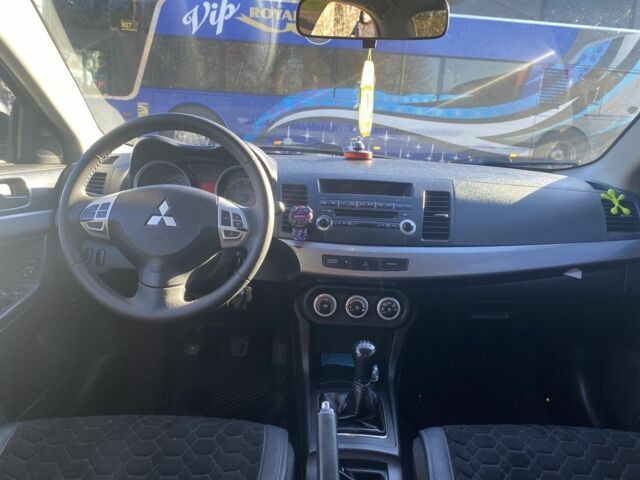 Черный Мицубиси Лансер, объемом двигателя 2 л и пробегом 372 тыс. км за 6200 $, фото 10 на Automoto.ua