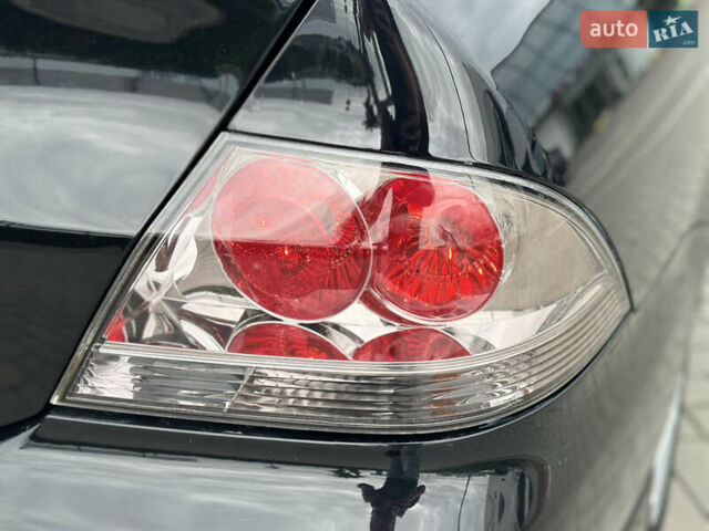 Чорний Міцубісі Lancer, об'ємом двигуна 2 л та пробігом 275 тис. км за 5300 $, фото 23 на Automoto.ua