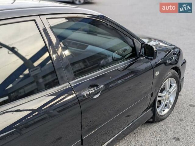Чорний Міцубісі Lancer, об'ємом двигуна 2 л та пробігом 152 тис. км за 5500 $, фото 3 на Automoto.ua