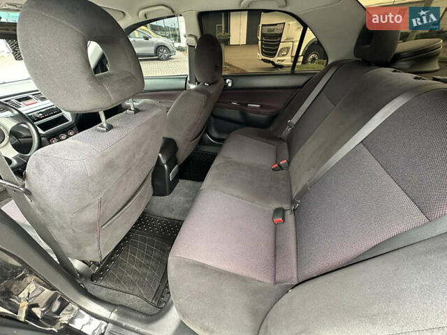 Чорний Міцубісі Lancer, об'ємом двигуна 2 л та пробігом 275 тис. км за 5300 $, фото 40 на Automoto.ua
