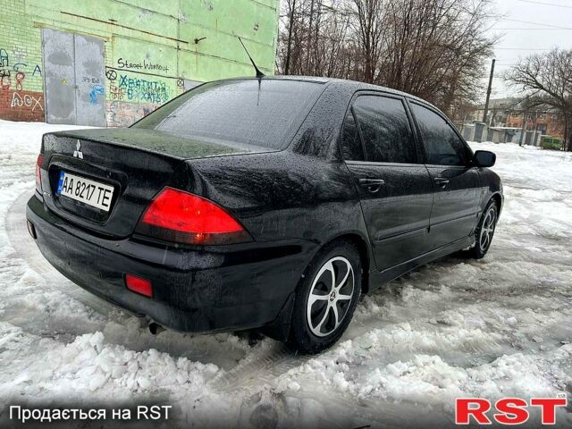 Чорний Міцубісі Lancer, об'ємом двигуна 1.6 л та пробігом 198 тис. км за 5600 $, фото 2 на Automoto.ua