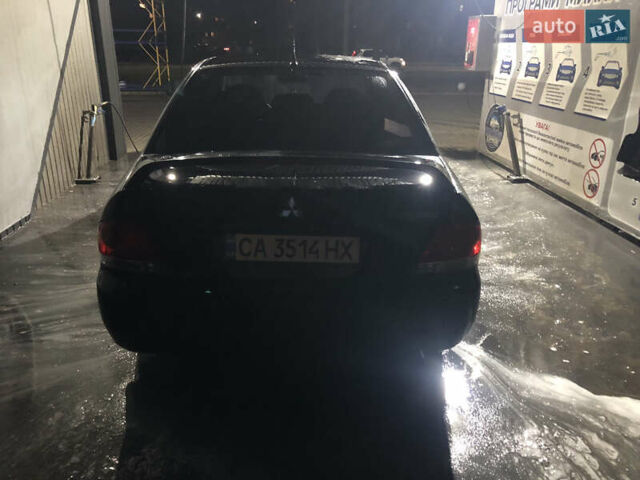 Чорний Міцубісі Lancer, об'ємом двигуна 1.6 л та пробігом 280 тис. км за 3800 $, фото 3 на Automoto.ua