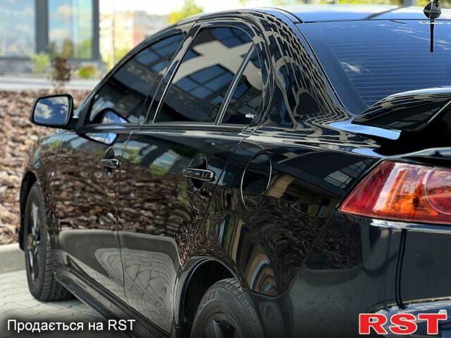 Чорний Міцубісі Lancer, об'ємом двигуна 2 л та пробігом 205 тис. км за 6500 $, фото 3 на Automoto.ua