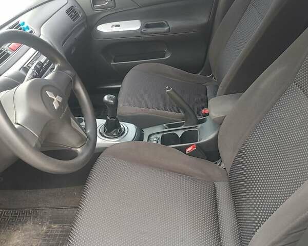 Чорний Міцубісі Lancer, об'ємом двигуна 1.58 л та пробігом 190 тис. км за 3750 $, фото 12 на Automoto.ua