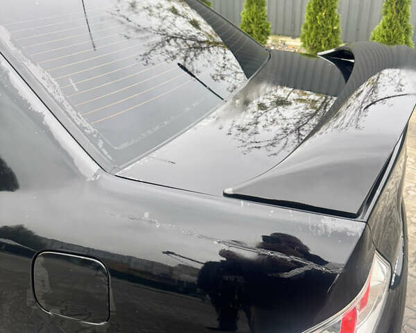 Чорний Міцубісі Lancer, об'ємом двигуна 2 л та пробігом 210 тис. км за 5500 $, фото 18 на Automoto.ua