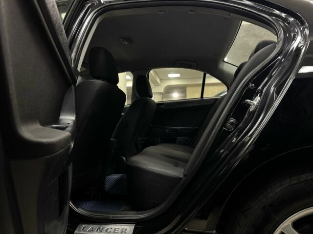 Чорний Міцубісі Lancer, об'ємом двигуна 1.5 л та пробігом 201 тис. км за 6900 $, фото 7 на Automoto.ua