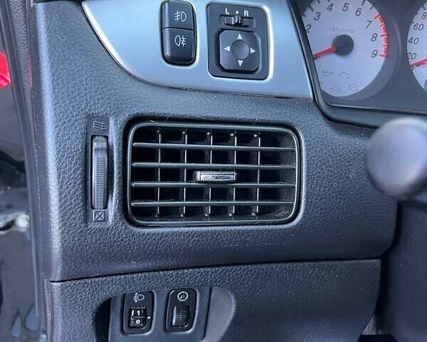 Черный Мицубиси Лансер, объемом двигателя 2 л и пробегом 280 тыс. км за 5400 $, фото 14 на Automoto.ua