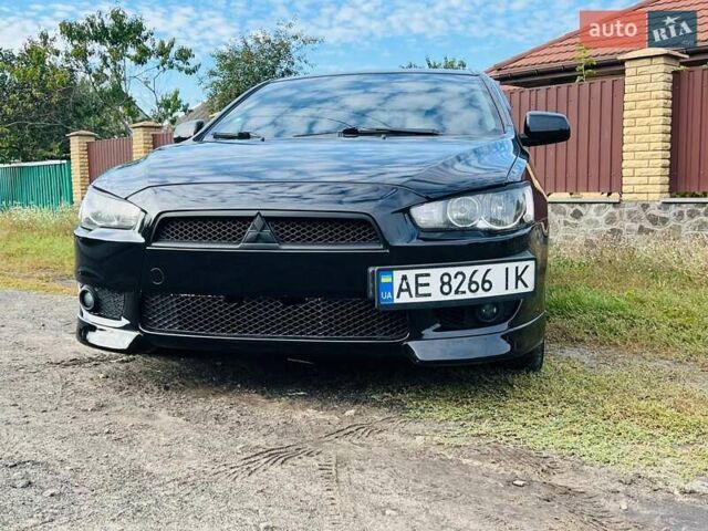 Чорний Міцубісі Lancer, об'ємом двигуна 2 л та пробігом 284 тис. км за 6200 $, фото 1 на Automoto.ua