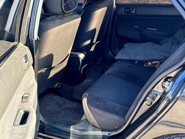 Черный Мицубиси Лансер, объемом двигателя 1.6 л и пробегом 249 тыс. км за 4444 $, фото 4 на Automoto.ua