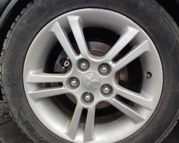 Чорний Міцубісі Lancer, об'ємом двигуна 2 л та пробігом 145 тис. км за 5000 $, фото 10 на Automoto.ua