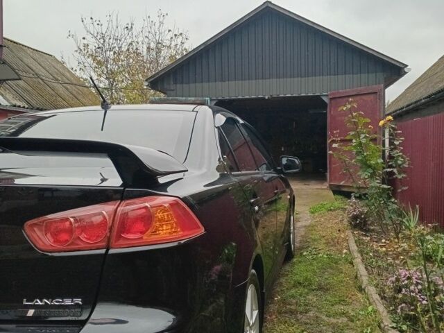 Чорний Міцубісі Lancer, об'ємом двигуна 2 л та пробігом 273 тис. км за 7100 $, фото 4 на Automoto.ua