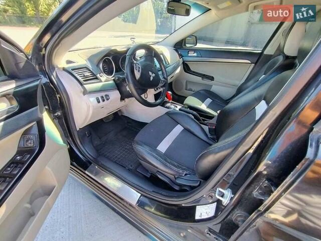 Чорний Міцубісі Lancer, об'ємом двигуна 2 л та пробігом 268 тис. км за 5000 $, фото 10 на Automoto.ua