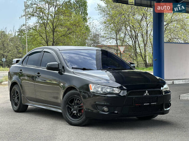 Чорний Міцубісі Lancer, об'ємом двигуна 2 л та пробігом 192 тис. км за 6500 $, фото 9 на Automoto.ua