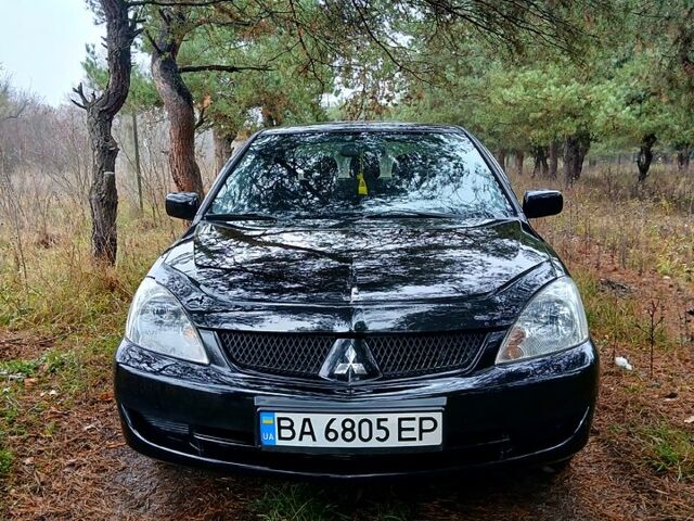 Чорний Міцубісі Lancer, об'ємом двигуна 1.6 л та пробігом 240 тис. км за 4700 $, фото 3 на Automoto.ua