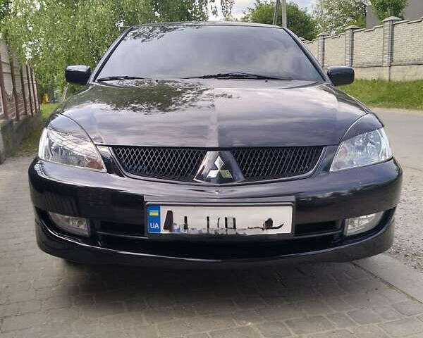 Чорний Міцубісі Lancer, об'ємом двигуна 0 л та пробігом 123 тис. км за 5200 $, фото 2 на Automoto.ua