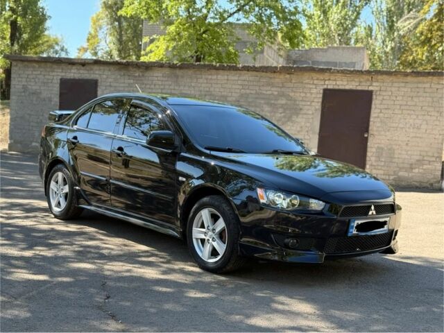 Чорний Міцубісі Lancer, об'ємом двигуна 1.5 л та пробігом 207 тис. км за 6400 $, фото 3 на Automoto.ua