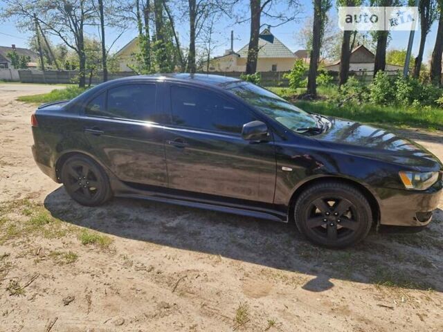 Чорний Міцубісі Lancer, об'ємом двигуна 2 л та пробігом 247 тис. км за 5500 $, фото 2 на Automoto.ua