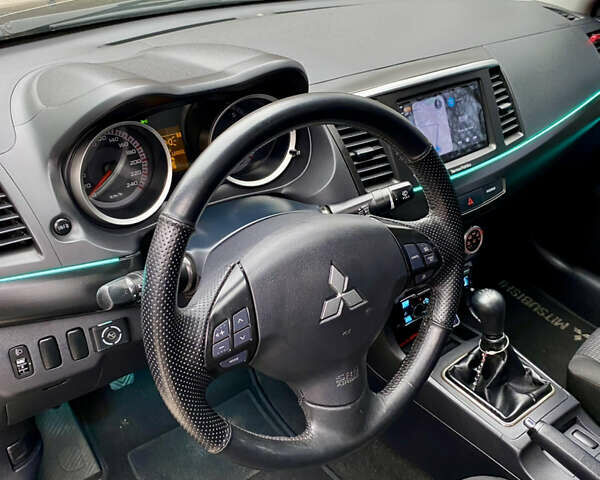 Черный Мицубиси Лансер, объемом двигателя 2 л и пробегом 164 тыс. км за 8300 $, фото 19 на Automoto.ua