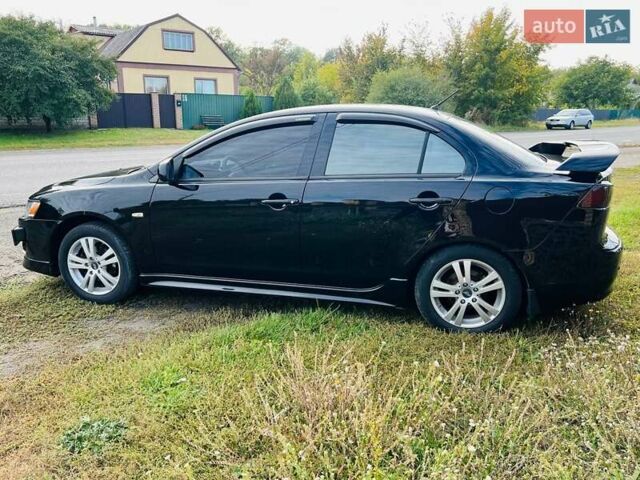 Чорний Міцубісі Lancer, об'ємом двигуна 2 л та пробігом 284 тис. км за 6200 $, фото 7 на Automoto.ua