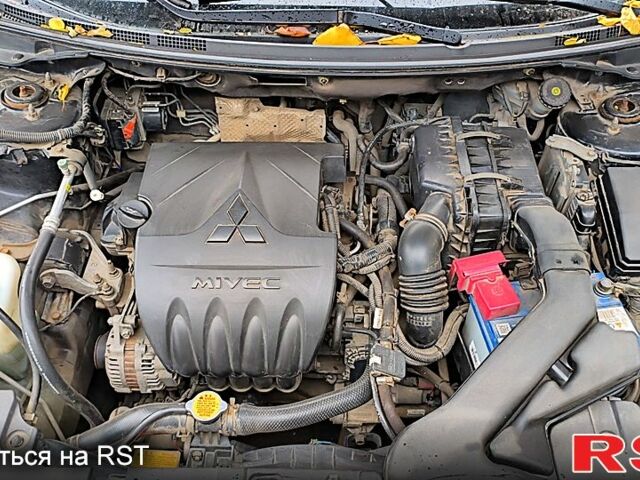 Черный Мицубиси Лансер, объемом двигателя 1.5 л и пробегом 207 тыс. км за 5500 $, фото 10 на Automoto.ua