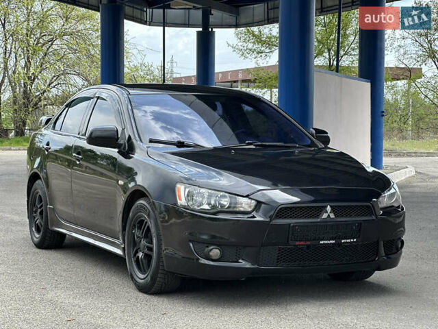 Чорний Міцубісі Lancer, об'ємом двигуна 2 л та пробігом 192 тис. км за 6500 $, фото 4 на Automoto.ua