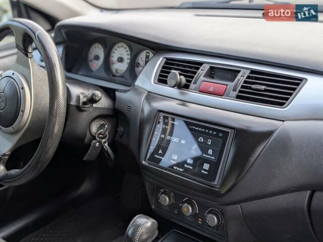 Чорний Міцубісі Lancer, об'ємом двигуна 2 л та пробігом 152 тис. км за 5500 $, фото 10 на Automoto.ua