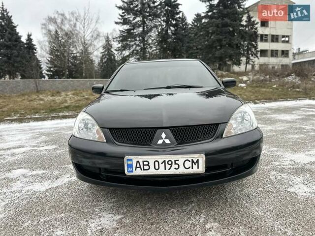 Чорний Міцубісі Lancer, об'ємом двигуна 1.6 л та пробігом 160 тис. км за 4600 $, фото 30 на Automoto.ua