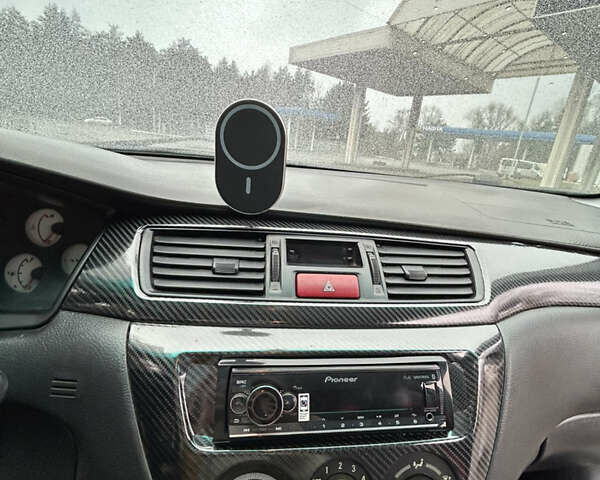 Черный Мицубиси Лансер, объемом двигателя 1.58 л и пробегом 254 тыс. км за 5000 $, фото 23 на Automoto.ua