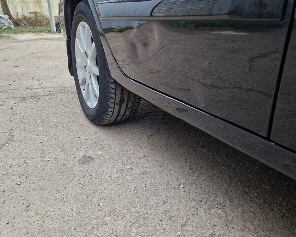 Чорний Міцубісі Lancer, об'ємом двигуна 1.6 л та пробігом 273 тис. км за 3999 $, фото 6 на Automoto.ua