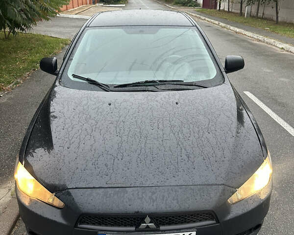 Чорний Міцубісі Lancer, об'ємом двигуна 2 л та пробігом 292 тис. км за 4400 $, фото 3 на Automoto.ua