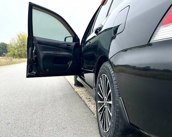 Чорний Міцубісі Lancer, об'ємом двигуна 1.6 л та пробігом 212 тис. км за 4700 $, фото 12 на Automoto.ua