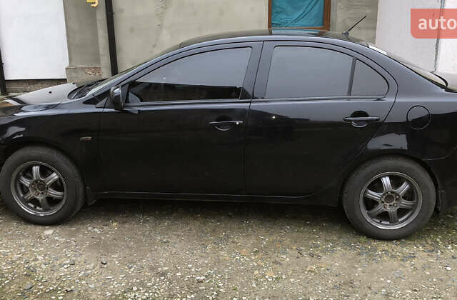 Чорний Міцубісі Lancer, об'ємом двигуна 1.5 л та пробігом 244 тис. км за 5000 $, фото 4 на Automoto.ua