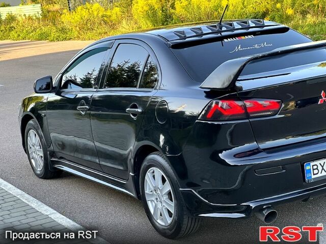 Черный Мицубиси Лансер, объемом двигателя 2 л и пробегом 216 тыс. км за 7500 $, фото 2 на Automoto.ua