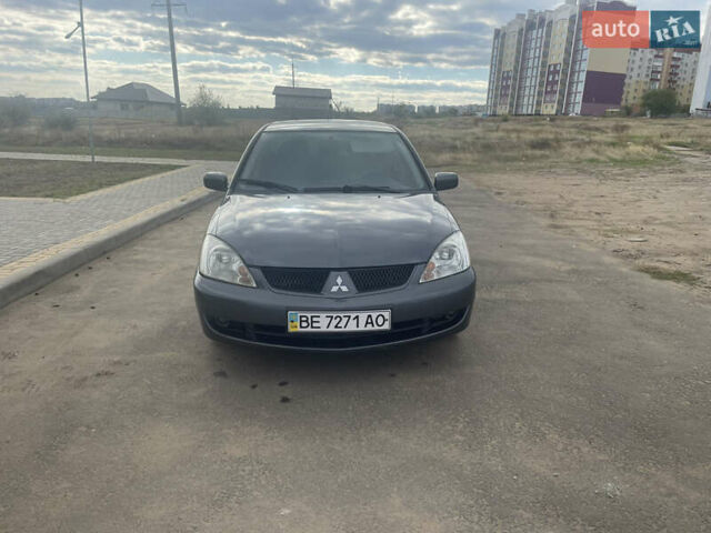 Чорний Міцубісі Lancer, об'ємом двигуна 1.6 л та пробігом 162 тис. км за 4650 $, фото 1 на Automoto.ua