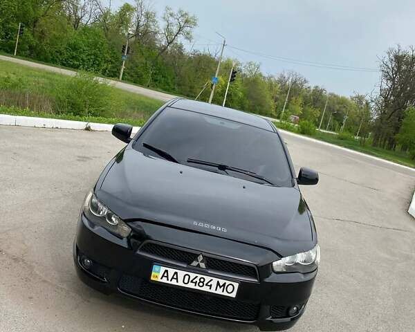 Чорний Міцубісі Lancer, об'ємом двигуна 2 л та пробігом 270 тис. км за 7000 $, фото 4 на Automoto.ua