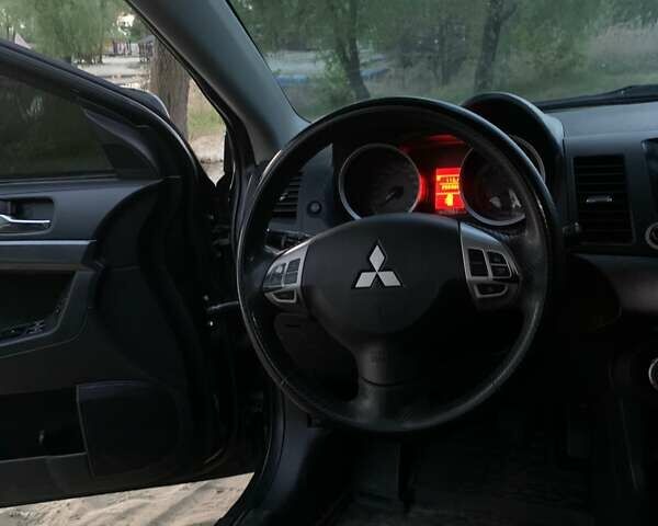 Мицубиси Лансер 2007 в Харькове на Automoto.ua Черный Мицубиси Лансер, объемом двигателя 2 л и пробегом 260 тыс. км за 5700 $, фото 2 на Automoto.ua