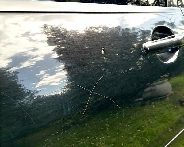 Черный Мицубиси Лансер, объемом двигателя 1.58 л и пробегом 200 тыс. км за 4000 $, фото 3 на Automoto.ua