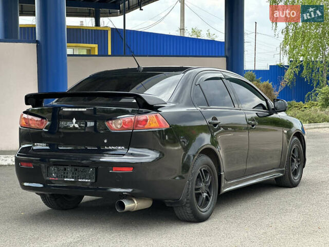Чорний Міцубісі Lancer, об'ємом двигуна 2 л та пробігом 192 тис. км за 6500 $, фото 5 на Automoto.ua