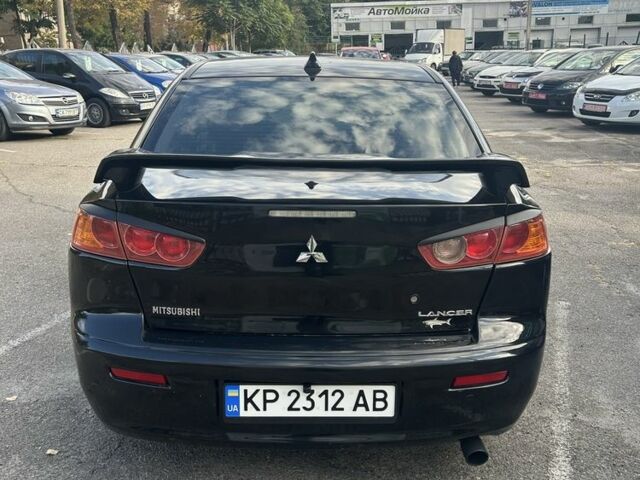 Мицубиси Лансер 2007 в Запорожье на Automoto.ua Черный Мицубиси Лансер, объемом двигателя 2 л и пробегом 208 тыс. км за 6800 $, фото 5 на Automoto.ua