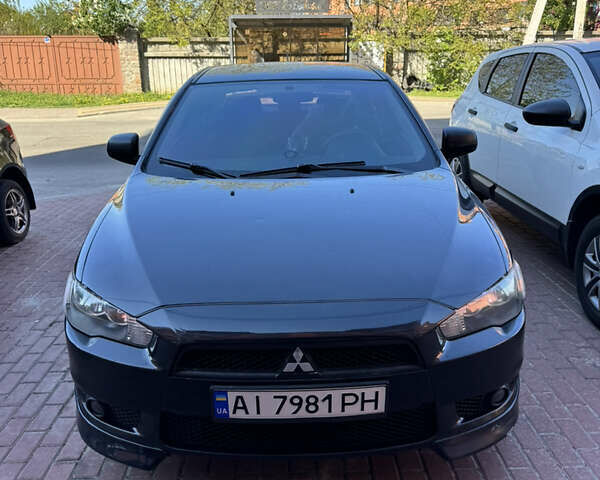 Чорний Міцубісі Lancer, об'ємом двигуна 2 л та пробігом 220 тис. км за 6500 $, фото 1 на Automoto.ua