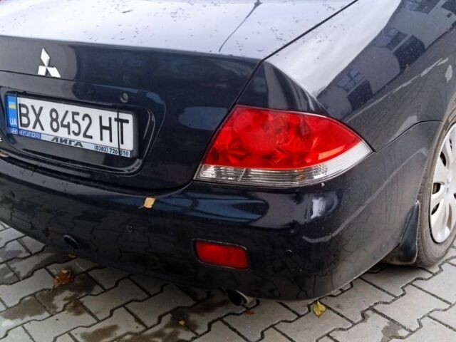 Черный Мицубиси Лансер, объемом двигателя 1.6 л и пробегом 223 тыс. км за 4300 $, фото 7 на Automoto.ua