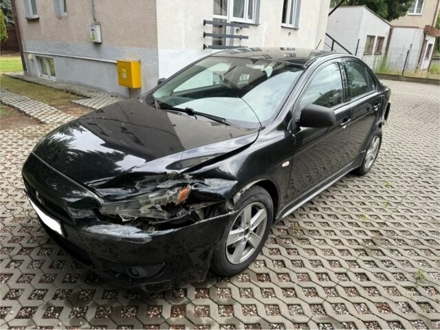Чорний Міцубісі Lancer, об'ємом двигуна 2 л та пробігом 245 тис. км за 3500 $, фото 1 на Automoto.ua