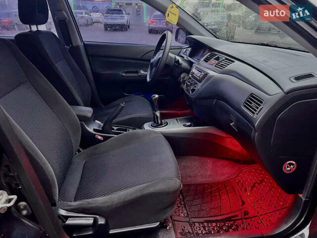 Чорний Міцубісі Lancer, об'ємом двигуна 1.6 л та пробігом 303 тис. км за 4350 $, фото 24 на Automoto.ua