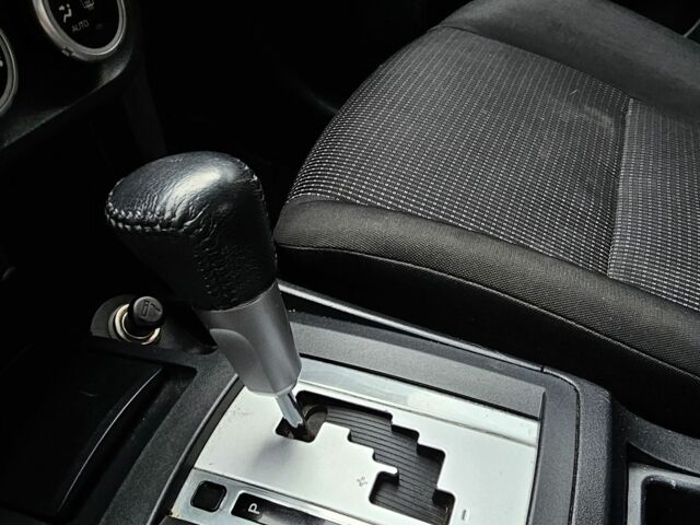 Черный Мицубиси Лансер, объемом двигателя 2 л и пробегом 115 тыс. км за 5000 $, фото 23 на Automoto.ua