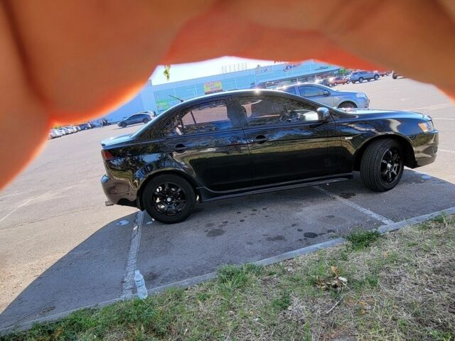 Чорний Міцубісі Lancer, об'ємом двигуна 2 л та пробігом 270 тис. км за 5500 $, фото 6 на Automoto.ua
