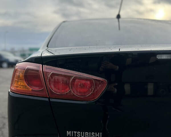 Чорний Міцубісі Lancer, об'ємом двигуна 1.5 л та пробігом 209 тис. км за 5500 $, фото 11 на Automoto.ua